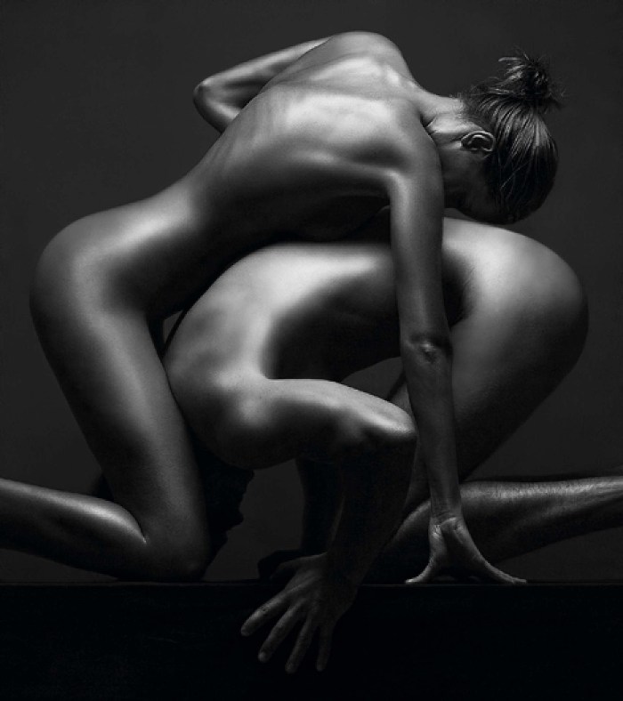 Poses for an erotic photo shoot