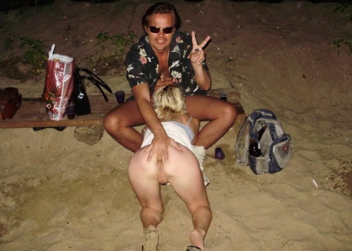 Girls squatting in a dress without panties