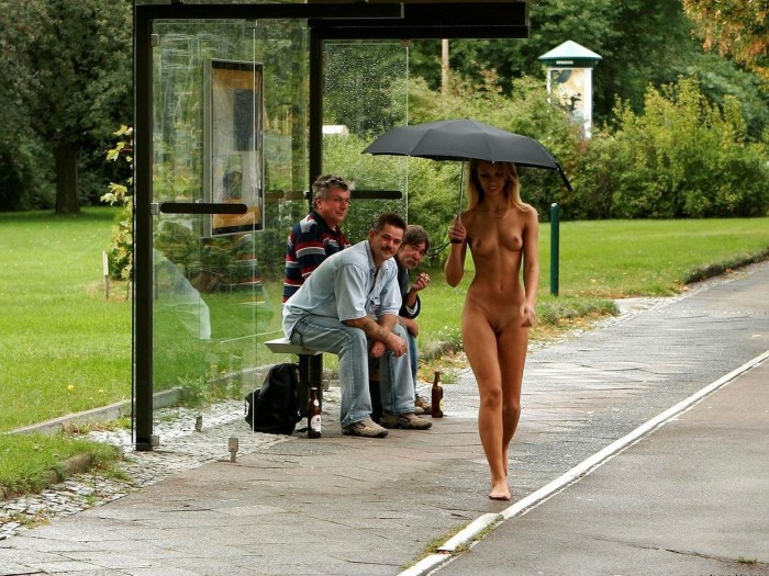 Naked women walk on the street