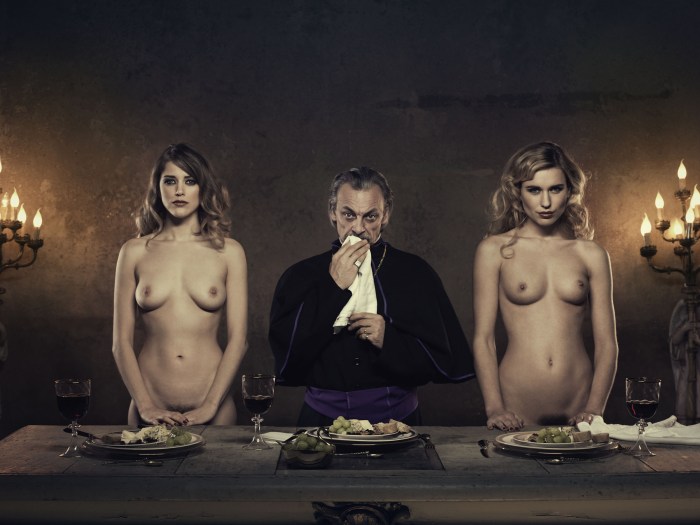 Naked woman at the table