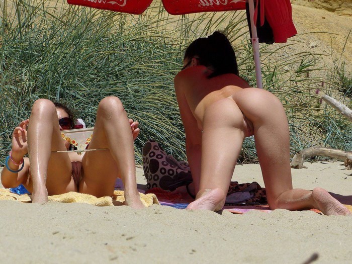 Women's masturbation on the beach