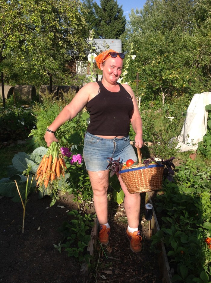 Woman in the country in the garden