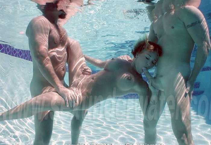 Naked with scuba dummy underwater