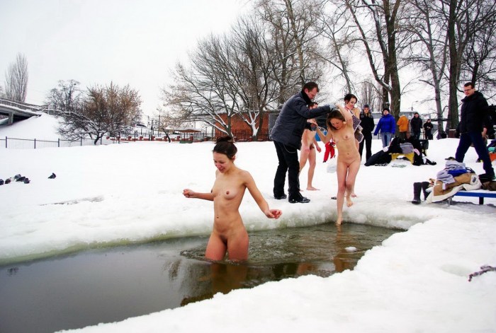 Naked women in the winter on the street