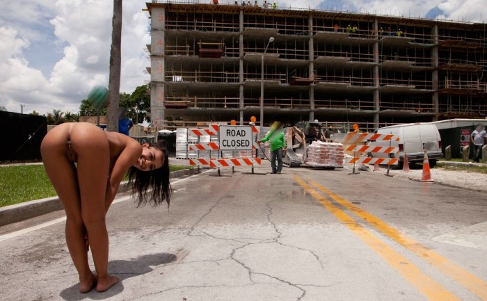 Girls naked at a construction site