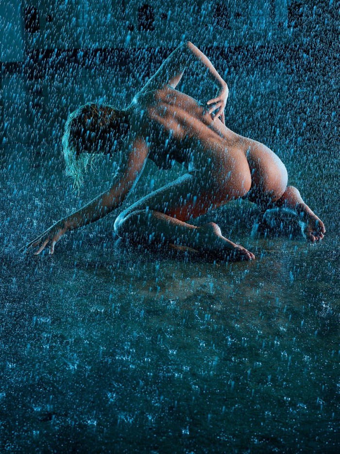 Naked women in the rain
