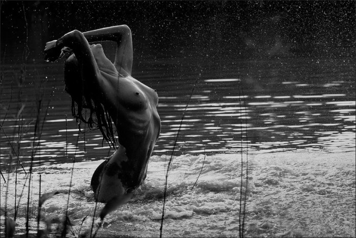 Girl naked in the rain