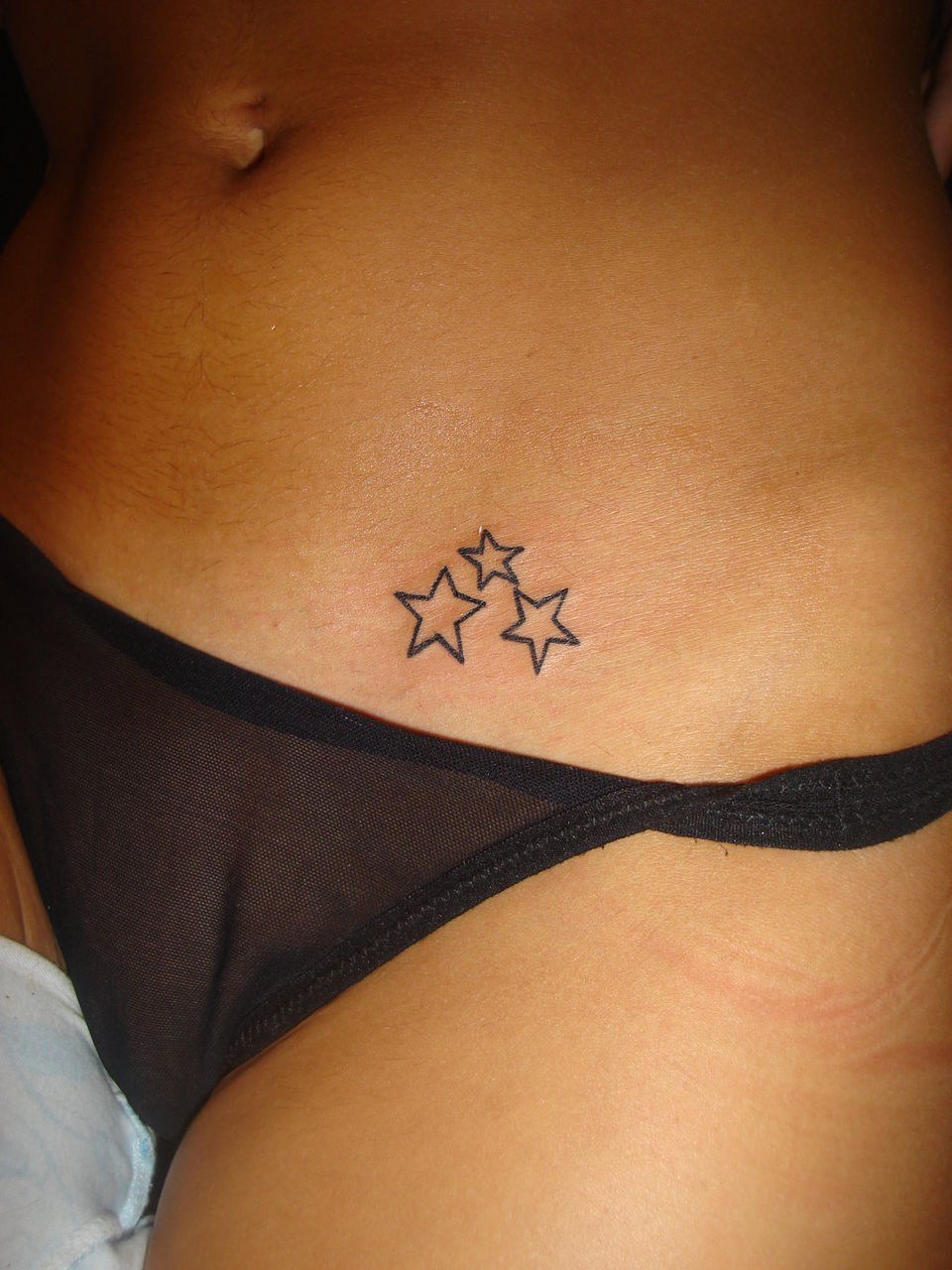 amateur 5 stars tattoo on stomach