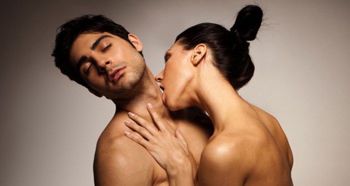 Woman on top of a man sitting