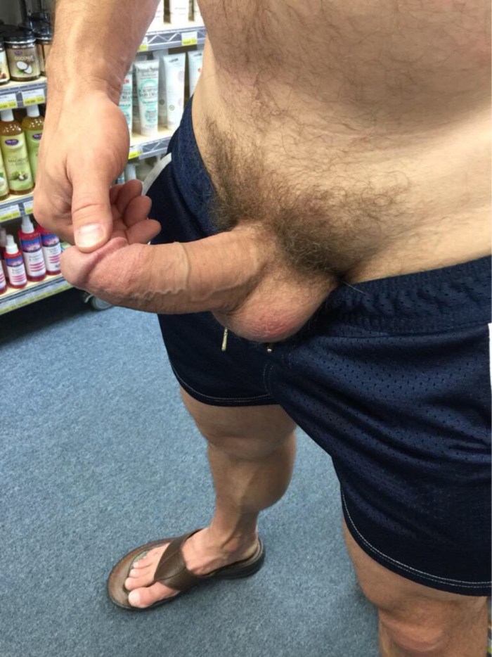 A huge member in shorts