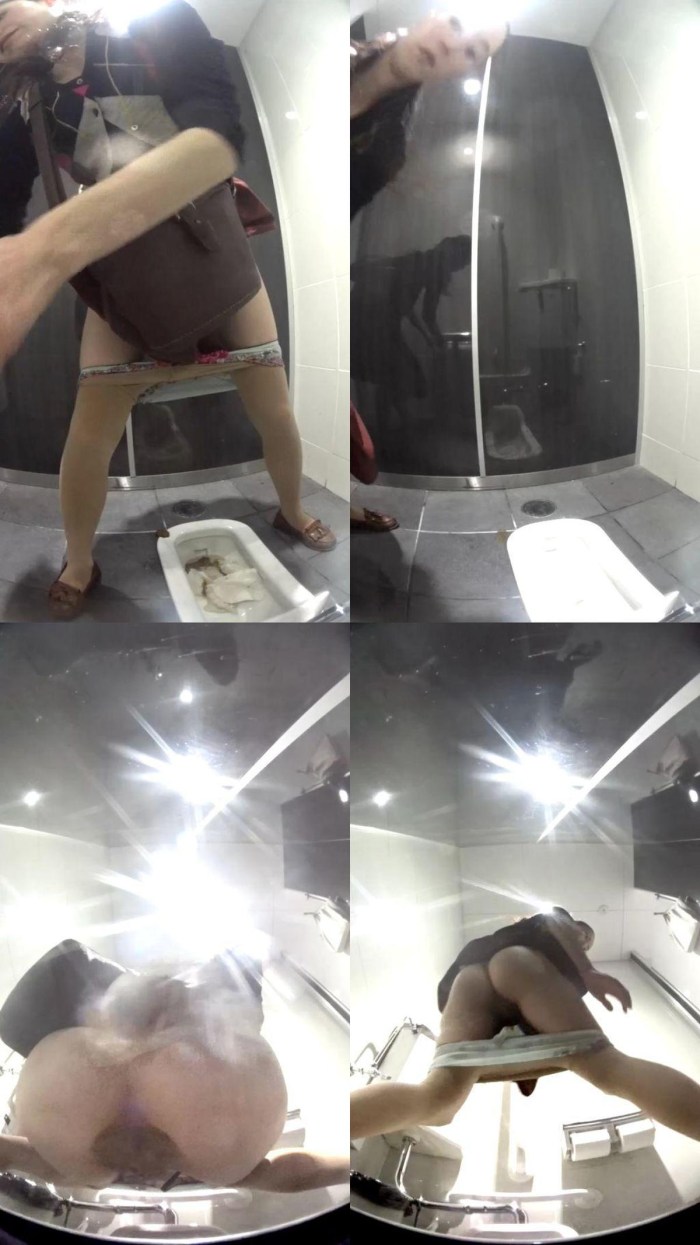 Alexis Fawx in the shower behind glass