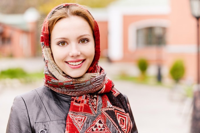 Woman in scarves and glasses