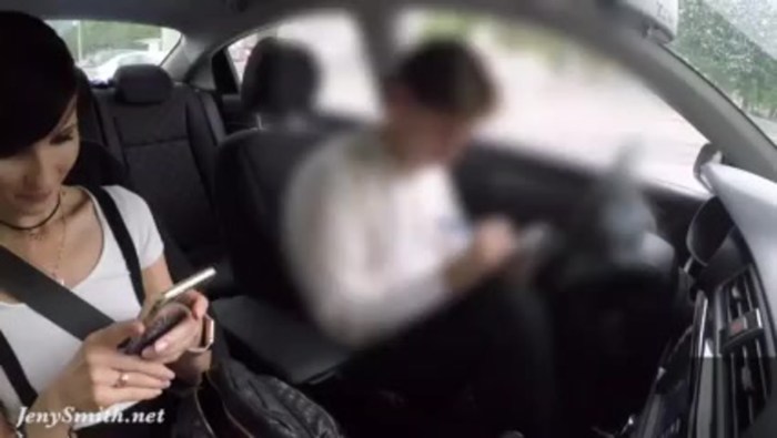 Girl in the cabin of a car