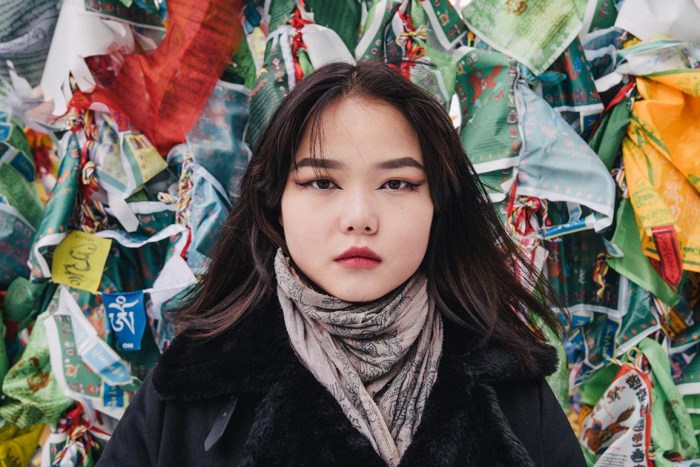 Male hands on female legs