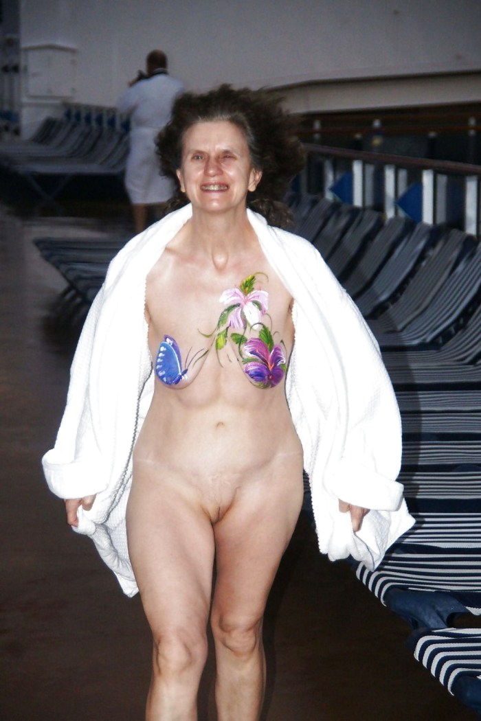 Naked old blonde in a peignoir