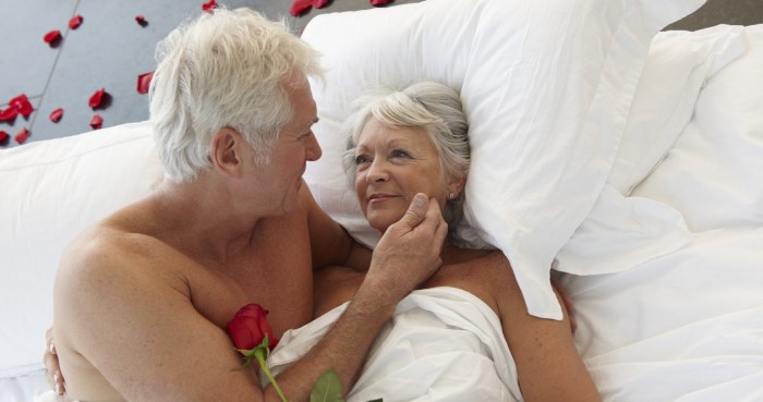 Elderly couple in bed