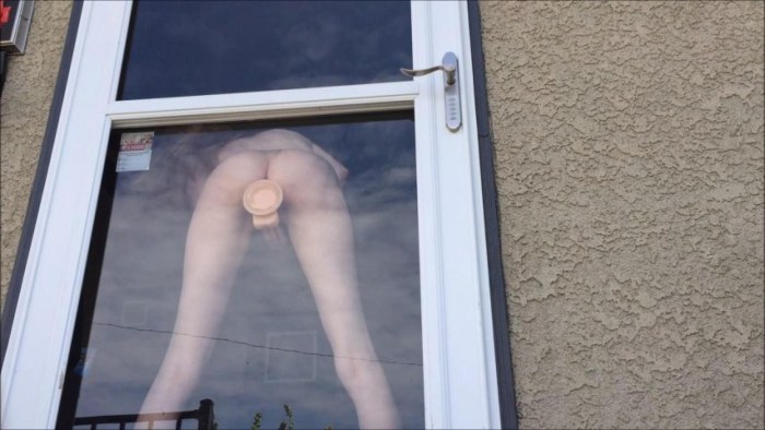 Masturbation of a girl on the balcony