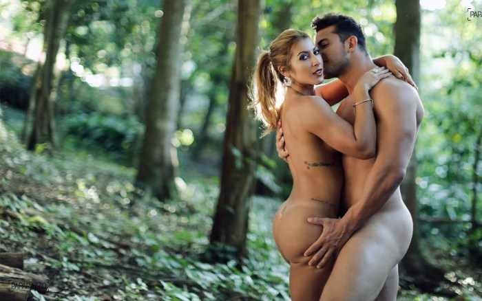 Naked men and women in nature