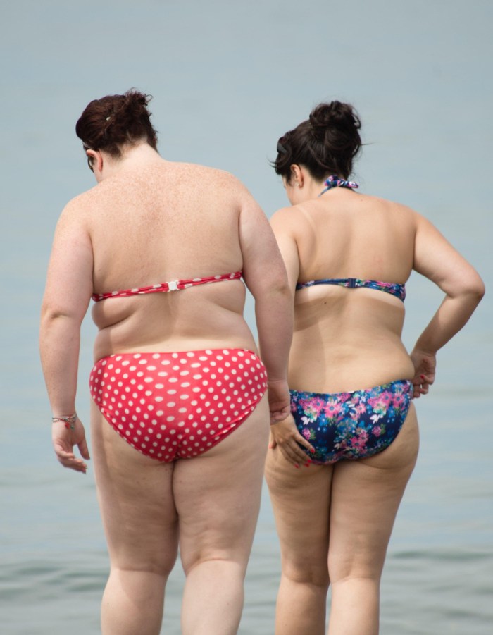 Unshaven women in swimsuits