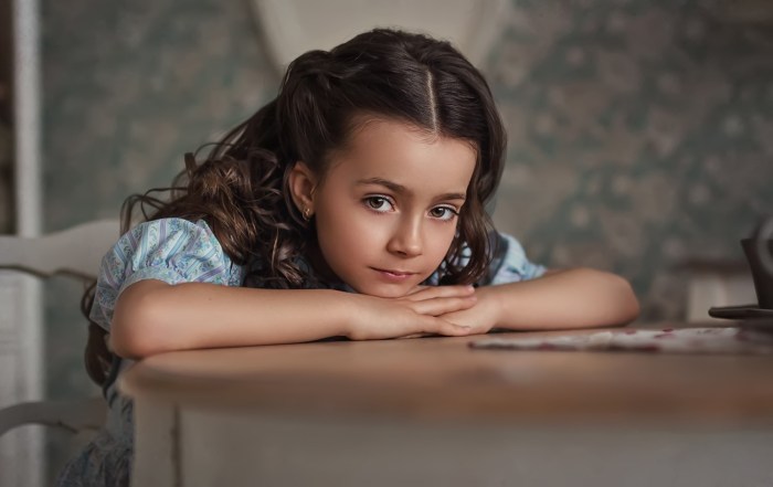 Children's photo shoot on the bed