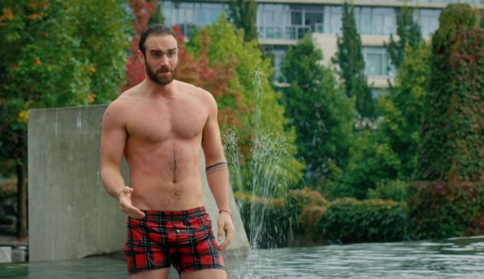 Young guy in swimming trunks