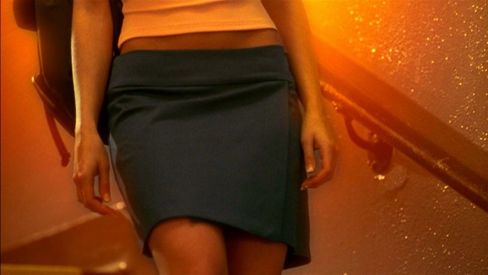 The pencil's skirt lifted her skirt