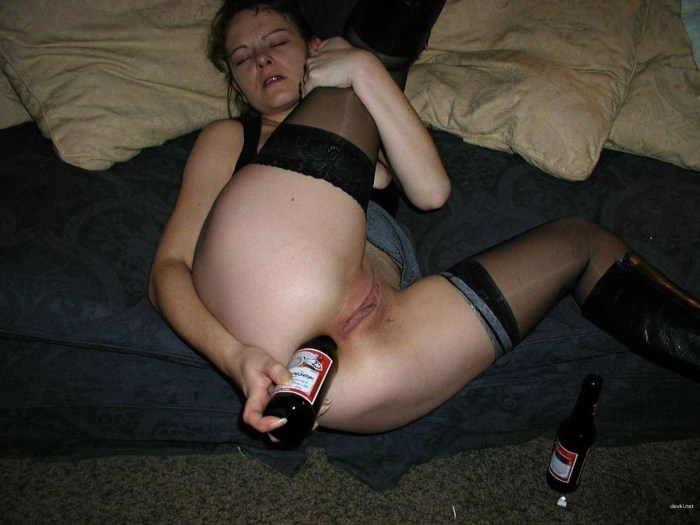 Champagne bottle in the ass