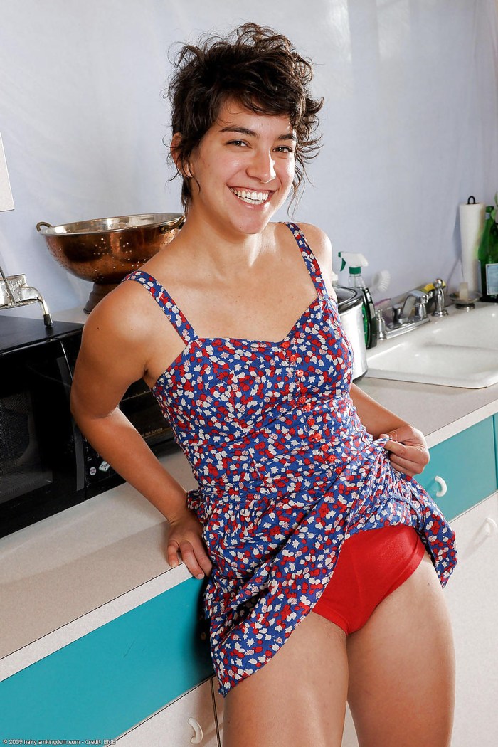 Young brunette with an unshaven pussy