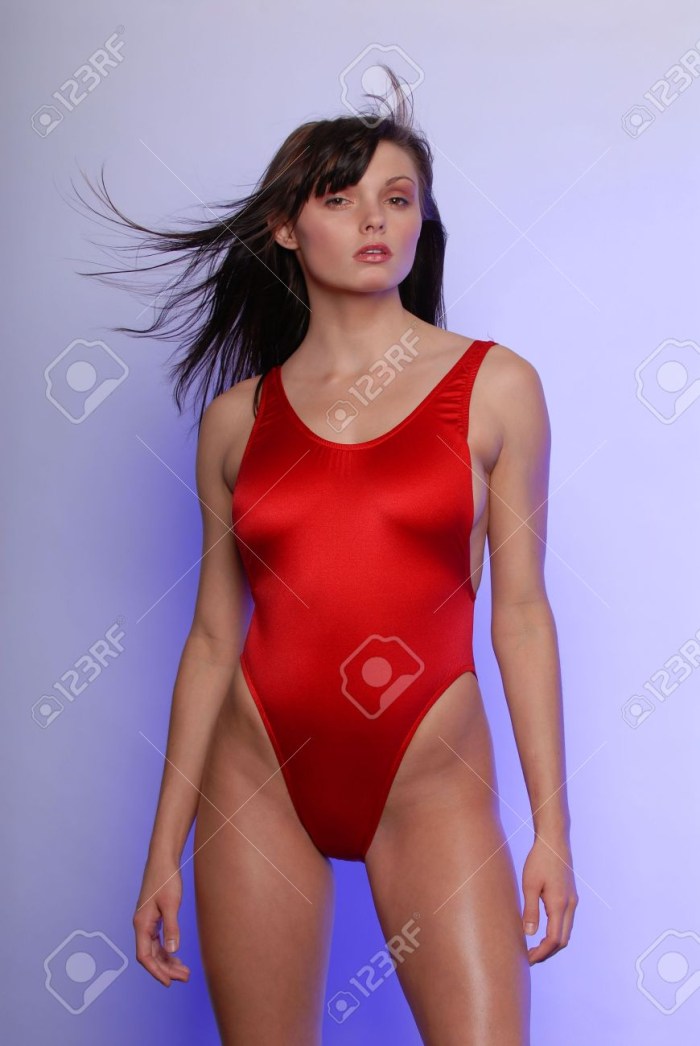 Wet girl in a red swimsuit