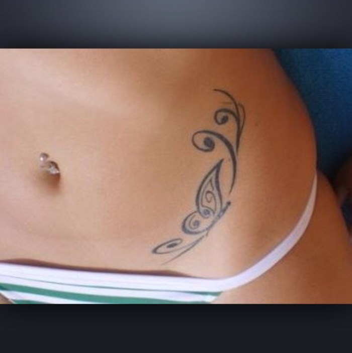 Tattoo on the stomach are women's small