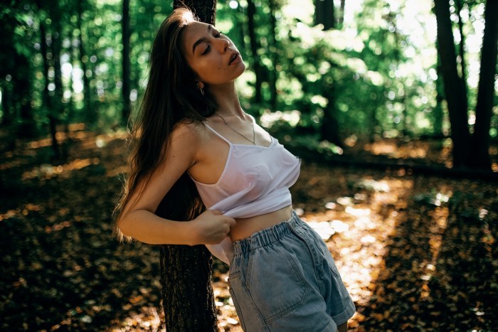 Naked gymnast on a rope