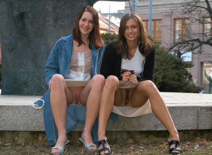 Naked women in public with a friend