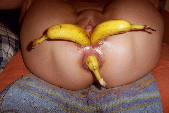 Girl with a banana in a vagina