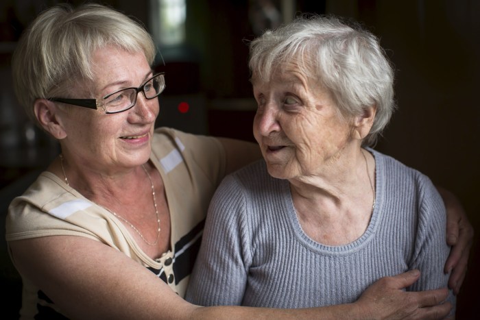 Two elderly women on a bench