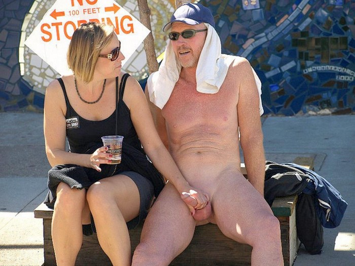 Men undress on the street