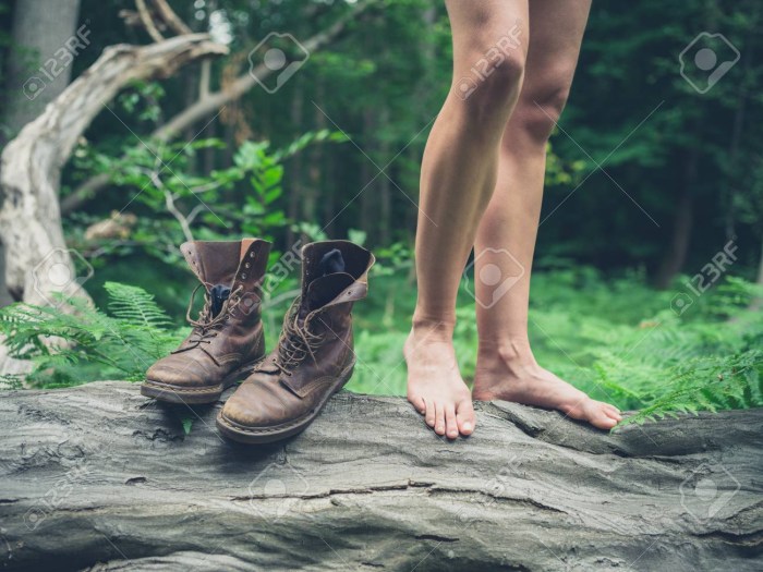 Men's legs in the forest