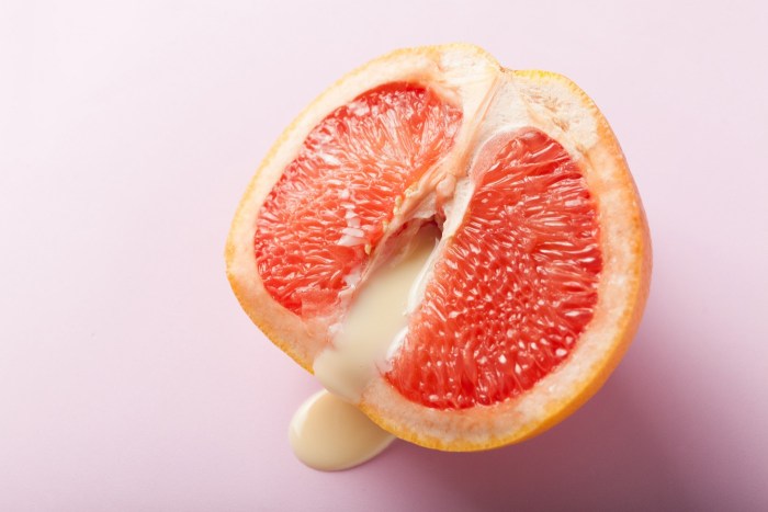 Fingers in grapefruit