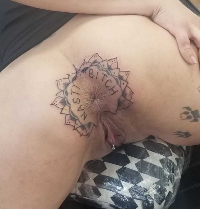 Masturbation with tattoo on the leg