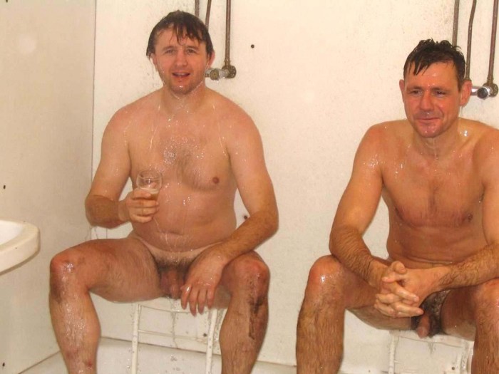 Naked guys bathing in the river