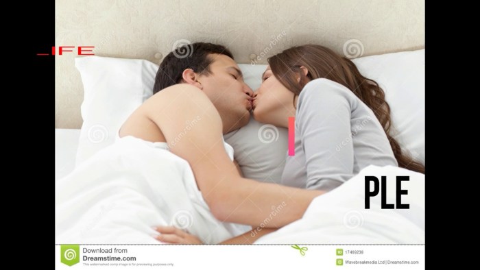 Man and woman in bed suck