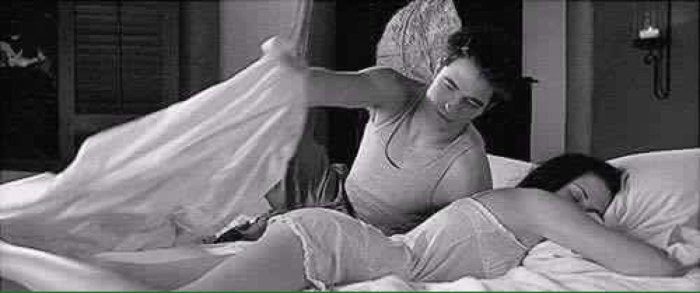 The guy settles the girl to sleep