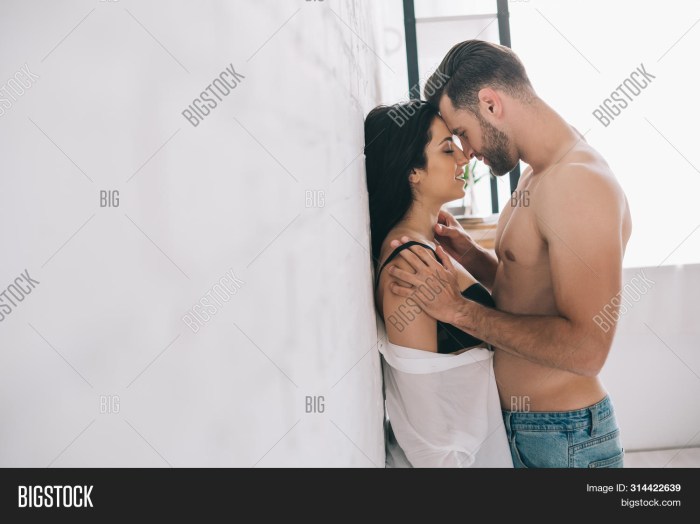 A man hugs a naked type