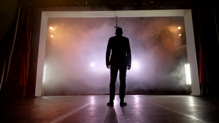Actor on the stage from the back