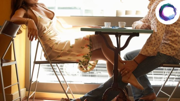 The boy climbs under the skirt