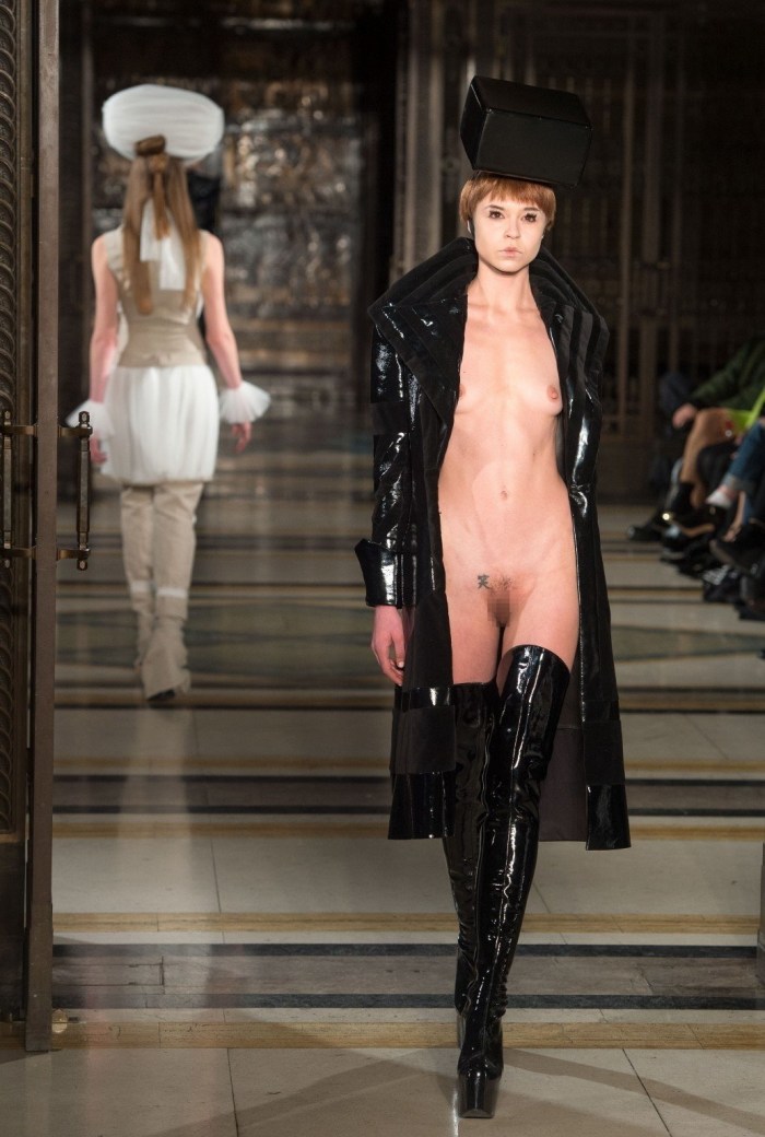 Naked fashion model on the catwalk