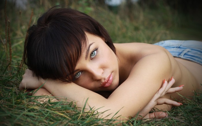 Young girl poses in nature