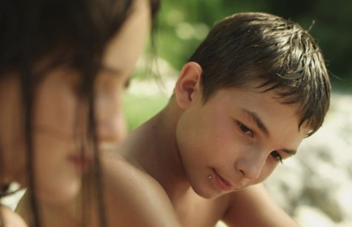 12 YEARS BOY Maxim Busonos in a stroller