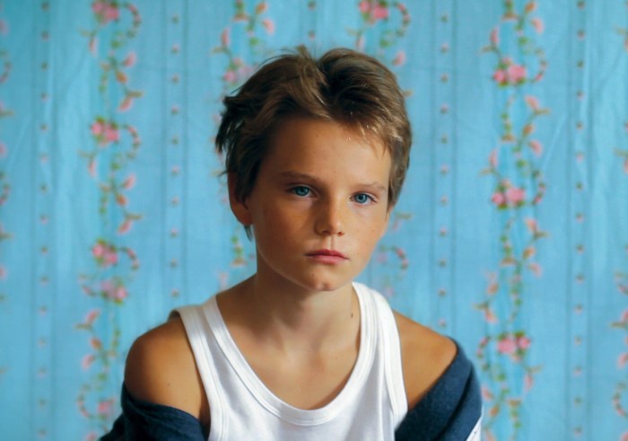 The girl lies on the guy's back