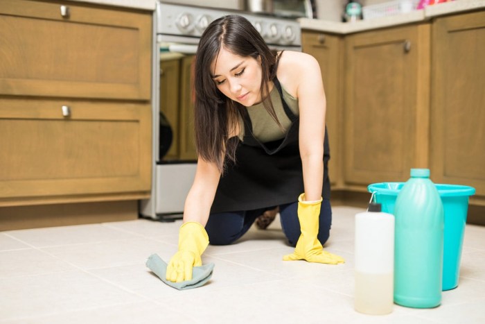 Washing the floor of the maid