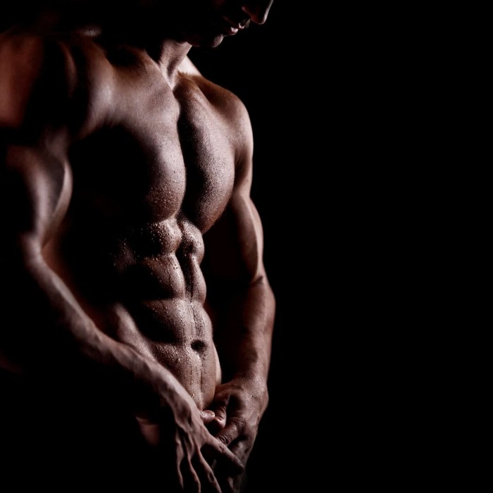 Men's body on a black background